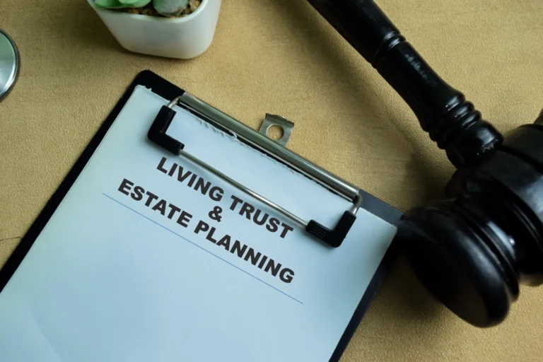 Stoneham estate planning attorney preparing living trust documents.